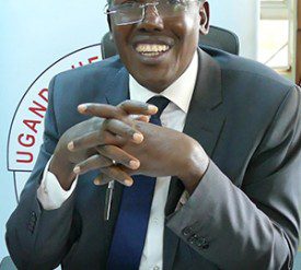 Dr John Omagino, Executive Director