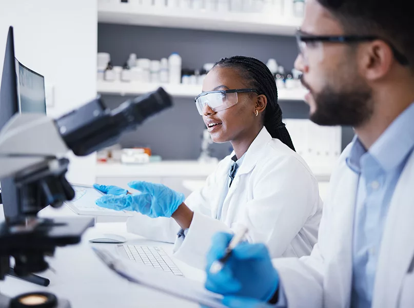 Scientist man, woman and checklist in laboratory