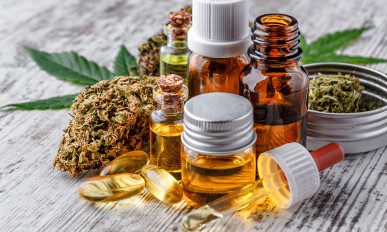Green leaves of medicinal cannabis with extract oil
