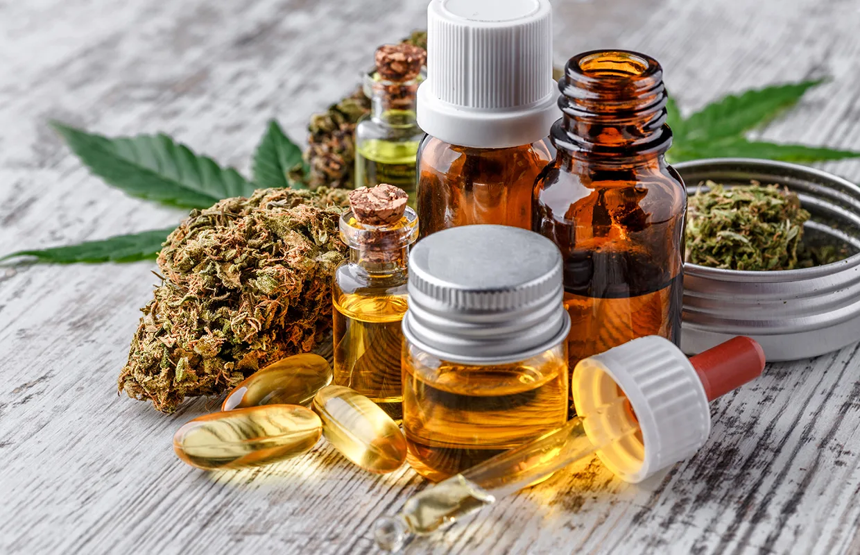 Green leaves of medicinal cannabis with extract oil