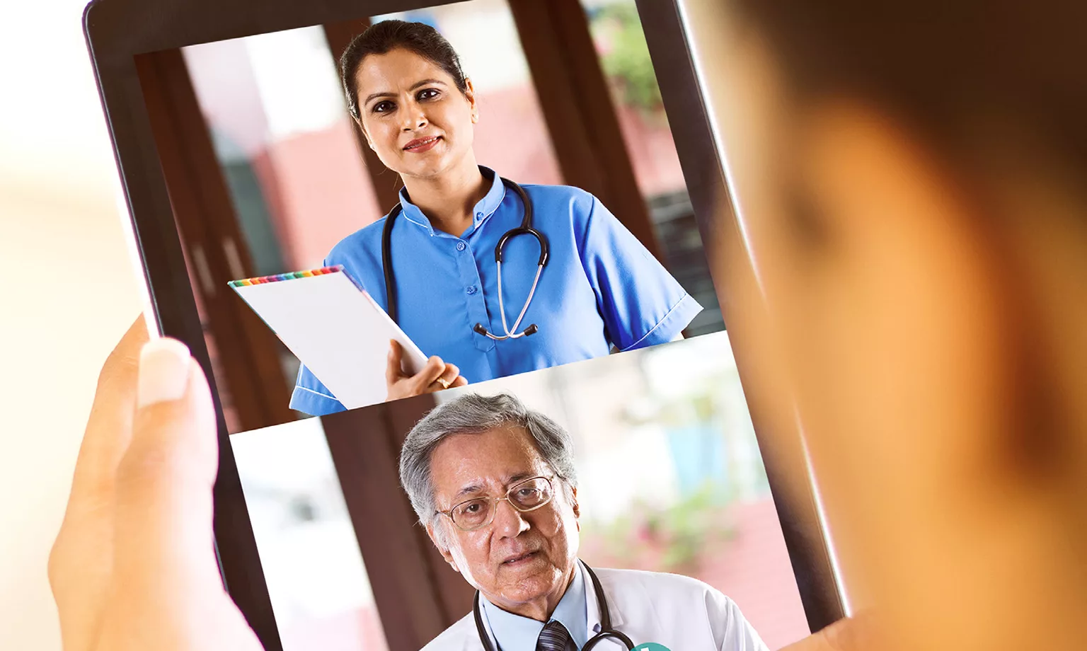 Woman in video conference with doctor